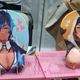 At Anime NYC a vendor sold oppai mouse pads of Kaeya and Zhongli from Genshin Impact.